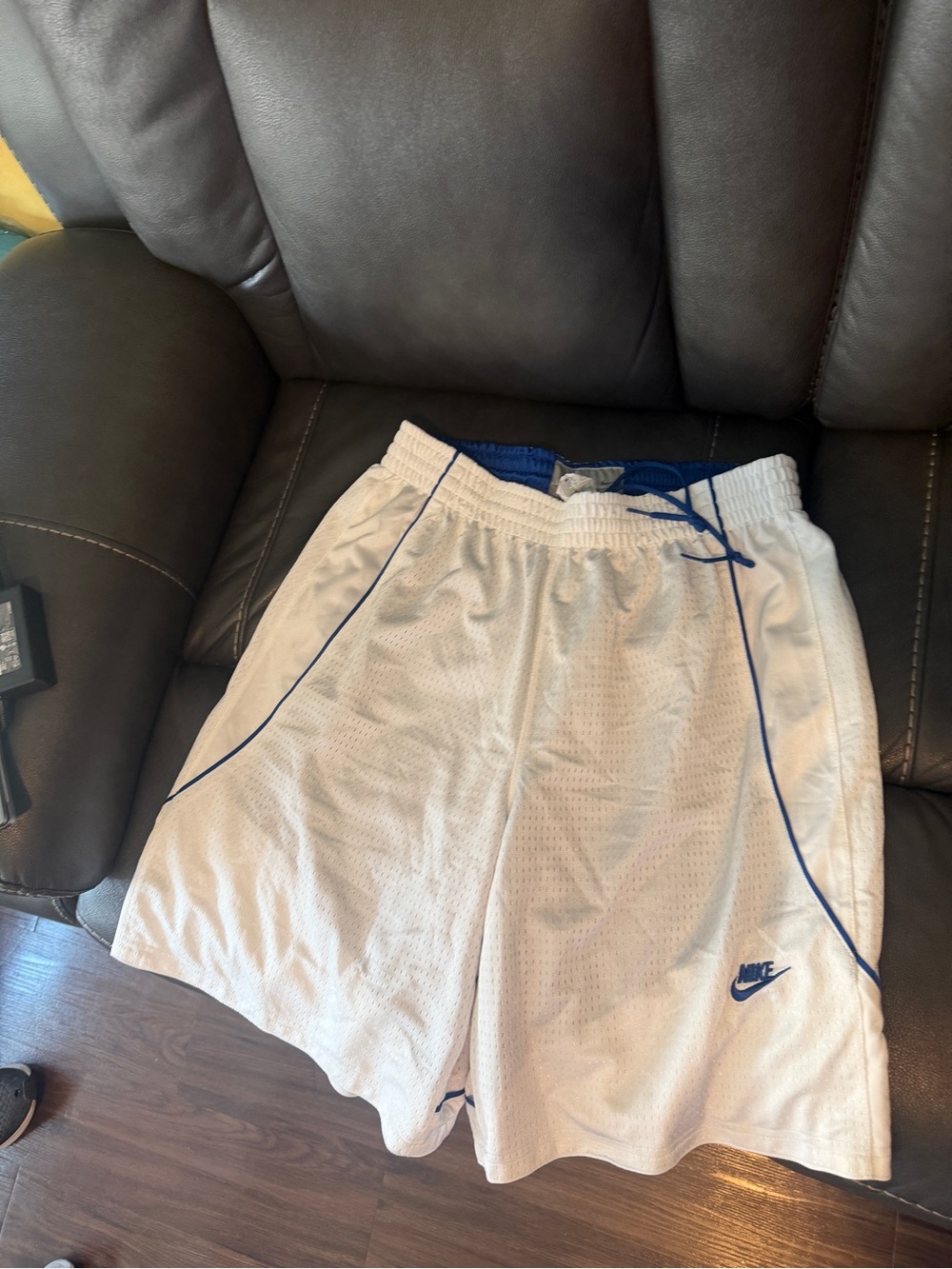 Nike Men’s White Athletic Shorts with Blue Accents